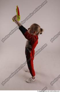 DENISA PILOT STANDING POSE WITH GUN 4